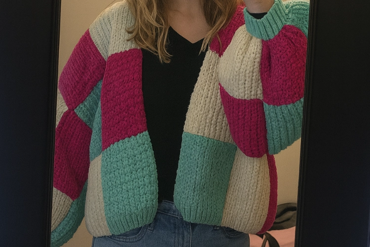 pink, blue and white crochet jumper